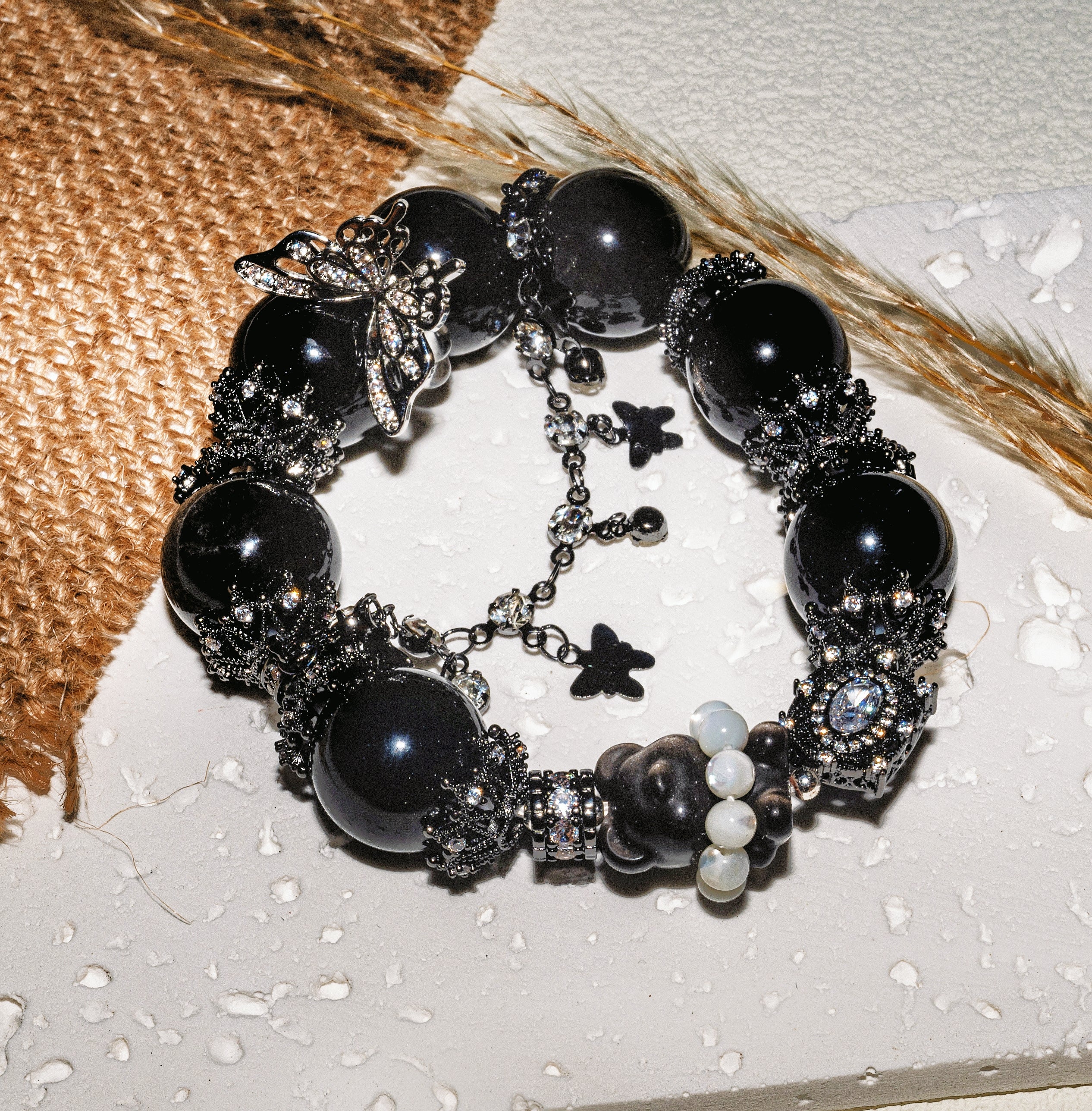Noir Flutter Teddy Bear —Dark, playful, and quietly tender.