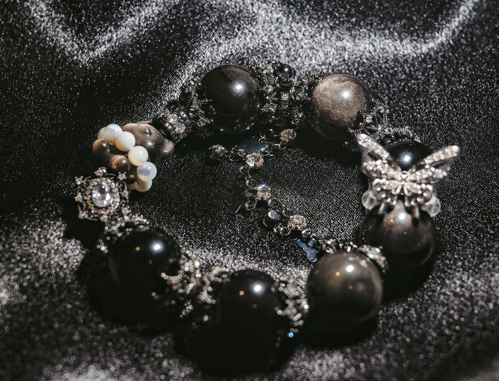 Noir Flutter Teddy Bear —Dark, playful, and quietly tender.