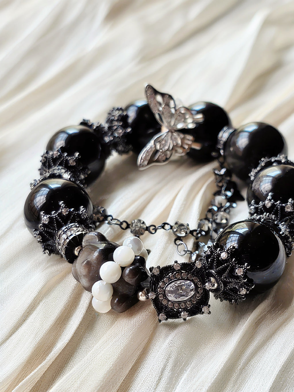 Noir Flutter Teddy Bear —Dark, playful, and quietly tender.