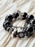 Noir Flutter Teddy Bear —Dark, playful, and quietly tender.