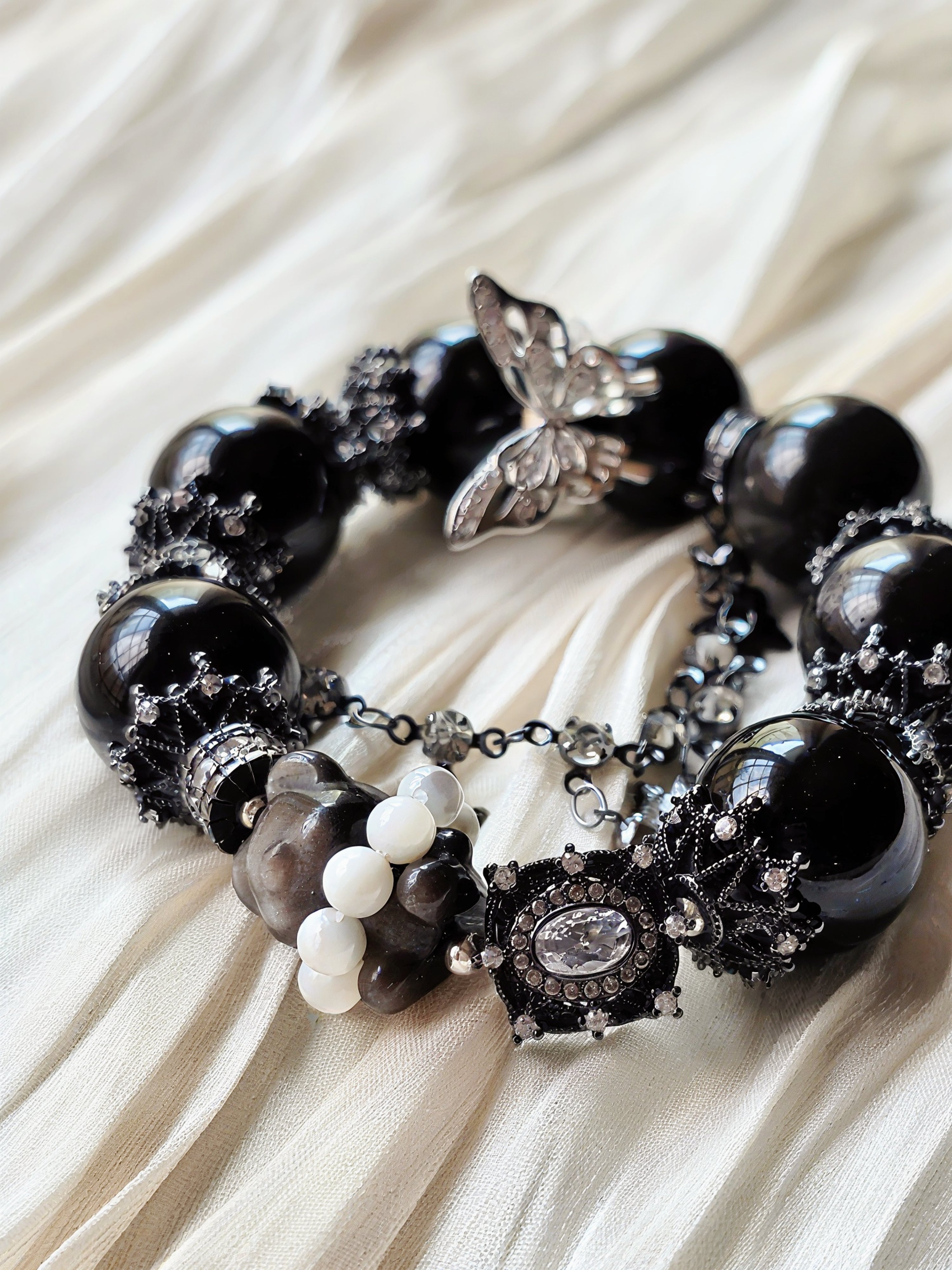 Noir Flutter Teddy Bear —Dark, playful, and quietly tender.